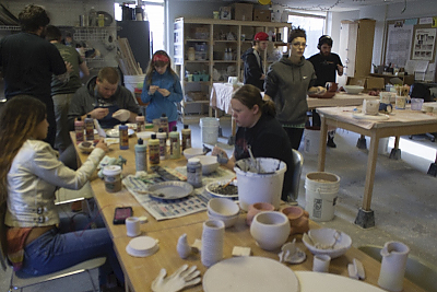 Students work in ceramics studio