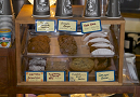 Three-tiered display case of baked goods